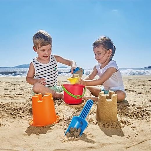 Kids playing with beach toys on the sand